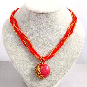 Red and Gold Multi-Strand Necklace with Peacock Pendant